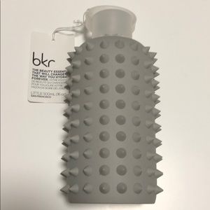 Glass water bottle with silicone sleeve